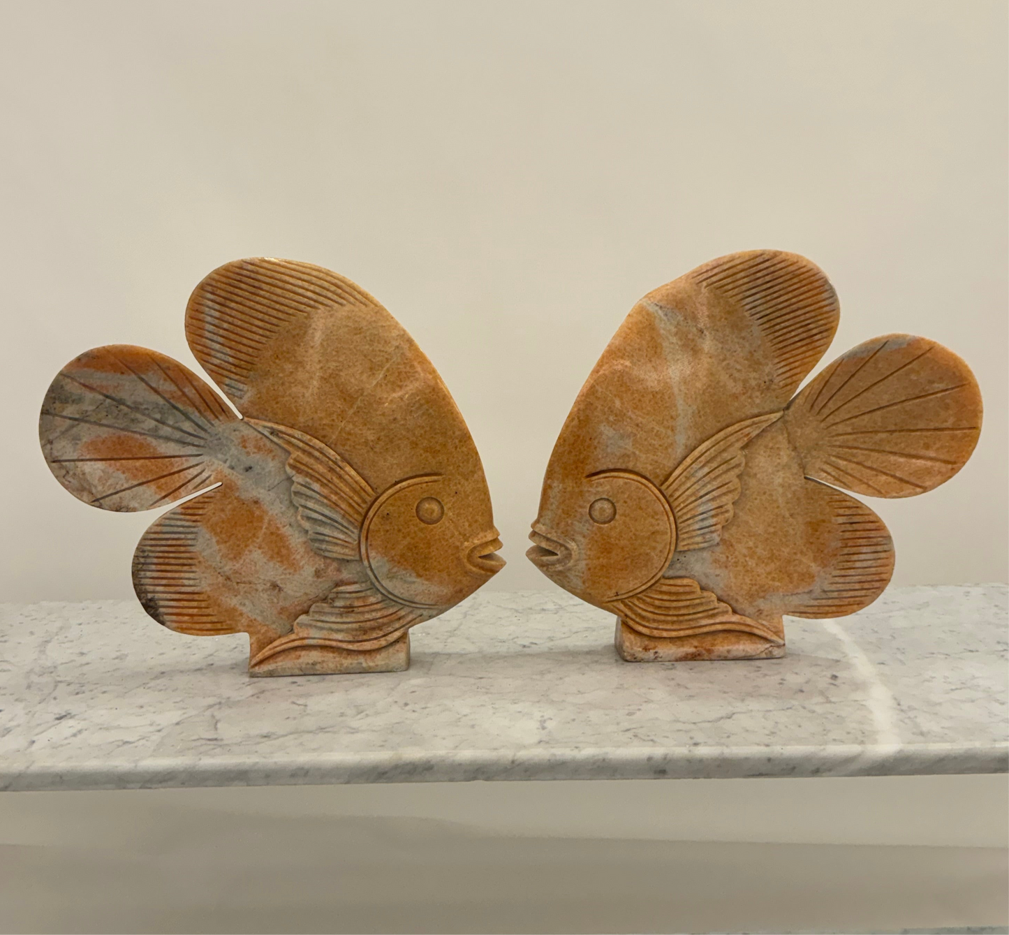 Orange marble fish sculpture set